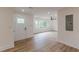 Open-concept living room with many windows, offering plenty of sunlight and outdoor views at 525 Rosemont Dr, Decatur, GA 30032