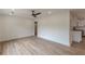 Large living room with an open floor plan, modern lighting, and seamless flow into the kitchen at 525 Rosemont Dr, Decatur, GA 30032