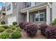 Charming home featuring a brick facade, well-manicured landscaping, and a two-car garage at 6240 Vista Crossing Way, Cumming, GA 30028