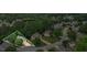 Aerial view of home in a community surrounded by lush greenery at 1444 Merrifield Ln, Marietta, GA 30062