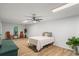 Spacious bedroom with a bed, a table, chairs, wood flooring, and natural light at 1444 Merrifield Ln, Marietta, GA 30062