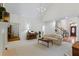 Bright and airy living room featuring a fireplace, vaulted ceilings, and hardwood floors at 1444 Merrifield Ln, Marietta, GA 30062