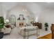 Bright living room with vaulted ceilings, a fireplace, and elegant decor at 1444 Merrifield Ln, Marietta, GA 30062
