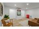 Living room featuring wood floors, a TV, a couch and Coca Cola refrigerator at 1444 Merrifield Ln, Marietta, GA 30062