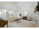 Spacious living room with a fireplace, vaulted ceilings, and hardwood floors at 1444 Merrifield Ln, Marietta, GA 30062