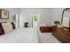 Bright main bedroom featuring neutral walls, white carpet, and a large window at 1444 Merrifield Ln, Marietta, GA 30062