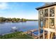 Lake house with large windows and backyard pool, perfect for waterfront living at 2746 Emerald Dr, Jonesboro, GA 30236