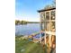 Lake house with large windows and backyard pool, perfect for waterfront living at 2746 Emerald Dr, Jonesboro, GA 30236