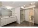Bright bathroom features an updated shower and vanity at 2746 Emerald Dr, Jonesboro, GA 30236