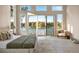 Bedroom with lake views and large windows providing natural light at 2746 Emerald Dr, Jonesboro, GA 30236