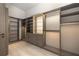 Spacious walk-in closet with custom shelves, drawers, and lighting at 2746 Emerald Dr, Jonesboro, GA 30236