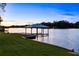 Beautiful dock on a serene lake, perfect for boating and waterfront activities at 2746 Emerald Dr, Jonesboro, GA 30236