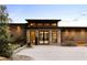Stunning modern home featuring a unique stone facade, a courtyard, and sophisticated landscaping at 2746 Emerald Dr, Jonesboro, GA 30236