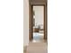 Hallway leading to a bedroom with hardwood floors and natural light at 2746 Emerald Dr, Jonesboro, GA 30236