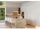 Stylish kitchen features a marble island, integrated appliances, and sleek cabinets at 2746 Emerald Dr, Jonesboro, GA 30236