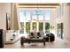 Bright and airy living room with soaring ceilings, a modern fireplace, and beautiful lake views at 2746 Emerald Dr, Jonesboro, GA 30236
