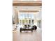 Bright and airy living room with soaring ceilings, a modern fireplace, and beautiful lake views at 2746 Emerald Dr, Jonesboro, GA 30236