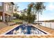 Stunning pool with poolside cabana, patio and lake views providing a relaxing outdoor oasis at 2746 Emerald Dr, Jonesboro, GA 30236