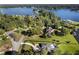 Lakefront property showcasing luxurious homes, lush landscaping, and serene water views at 3085 Lake Park Dr, Jonesboro, GA 30236