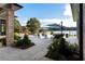 The backyard features a patio, lounge chairs, manicured landscaping, and lake access at 3085 Lake Park Dr, Jonesboro, GA 30236