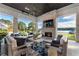 This beautiful covered patio with a brick fireplace provides the perfect outdoor living space at 3085 Lake Park Dr, Jonesboro, GA 30236