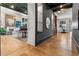 Hallway view of open floor plan featuring the living room, fireplace, and dining area at 3085 Lake Park Dr, Jonesboro, GA 30236