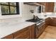 Modern kitchen featuring stainless steel appliances, a marble backsplash and countertops, and hardwood floors at 3085 Lake Park Dr, Jonesboro, GA 30236