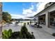 Beautiful patio with lounge seating overlooks the serene lake, perfect for relaxing and enjoying the waterfront view at 3085 Lake Park Dr, Jonesboro, GA 30236