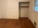 Bedroom with hardwood floors and a closet at 3794 W Hayward Ct, Tucker, GA 30084