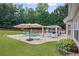Beautiful backyard with a swimming pool, lounge chairs, and an inviting outdoor dining area, perfect for outdoor enjoyment at 5928 Edenfield Nw Dr, Acworth, GA 30101