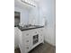 Well-lit bathroom featuring a modern vanity, countertop, and sleek fixtures, offering a comfortable and stylish space at 5928 Edenfield Nw Dr, Acworth, GA 30101
