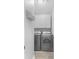 Convenient laundry room featuring modern washer and dryer at 5928 Edenfield Nw Dr, Acworth, GA 30101