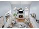 Open-concept living room with fireplace and abundant natural light at 5928 Edenfield Nw Dr, Acworth, GA 30101