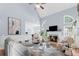 Bright living room with vaulted ceiling, fireplace and elegant furniture arrangement at 5928 Edenfield Nw Dr, Acworth, GA 30101