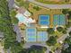 Bird's-eye view of the community's pools, tennis courts, and overall layout at 2510 Wood Creek Ct, Dacula, GA 30019