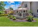 Backyard view with a spacious deck and lush green lawn; perfect for entertaining at 2510 Wood Creek Ct, Dacula, GA 30019