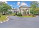 Clubhouse entrance with manicured landscaping provides an inviting arrival experience at 2510 Wood Creek Ct, Dacula, GA 30019