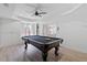 Finished basement game room features a pool table, recessed lighting, and fan. Provides a fun space for recreation at 2510 Wood Creek Ct, Dacula, GA 30019