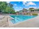 Large community swimming pool provides a refreshing outdoor space for relaxation at 2510 Wood Creek Ct, Dacula, GA 30019