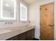 Bathroom featuring dual vanity with modern mirrors and fixtures at 3235 Roswell Ne Rd # 514, Atlanta, GA 30305