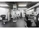 Modern gym featuring weight lifting equipment, cardio machines, and a mirrored wall at 3235 Roswell Ne Rd # 514, Atlanta, GA 30305