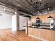 Open kitchen featuring wood cabinets, stainless steel appliances, and black countertops at 3235 Roswell Ne Rd # 514, Atlanta, GA 30305