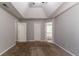 Bedroom features neutral walls, plush carpeting, a closet and an adjoining bathroom at 3470 River Mill Ln, Ellenwood, GA 30294