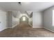 Upstairs bedroom with carpet and architectural ceiling at 3470 River Mill Ln, Ellenwood, GA 30294