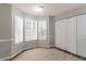 Bright breakfast nook featuring three windows for natural light and a closet at 3470 River Mill Ln, Ellenwood, GA 30294