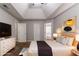 This main bedroom features a tray ceiling, multiple closets and an ensuite bath at 3470 River Mill Ln, Ellenwood, GA 30294