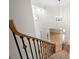 Grand two story foyer with hardwood floors and a staircase at 4711 Oakleigh Manor Dr, Powder Springs, GA 30127