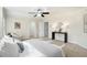 Well-lit main bedroom with comfortable seating and decorative furnishings at 4711 Oakleigh Manor Dr, Powder Springs, GA 30127