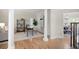 Home office featuring hardwood floors, neutral walls, and ample natural light at 4711 Oakleigh Manor Dr, Powder Springs, GA 30127