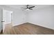 Spacious bedroom featuring new floors, neutral paint, a ceiling fan and white trim at 1111 Edgefield Sw Dr, Atlanta, GA 30310